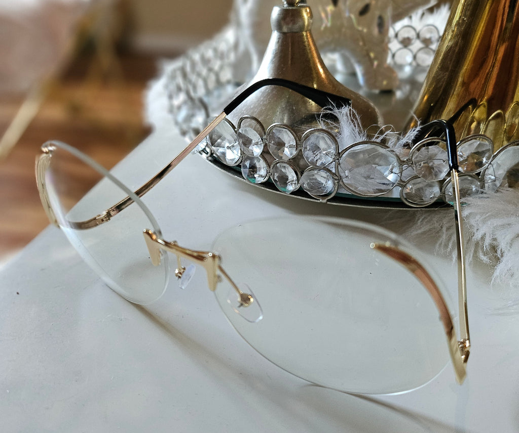 Clear and gold Sunglasses