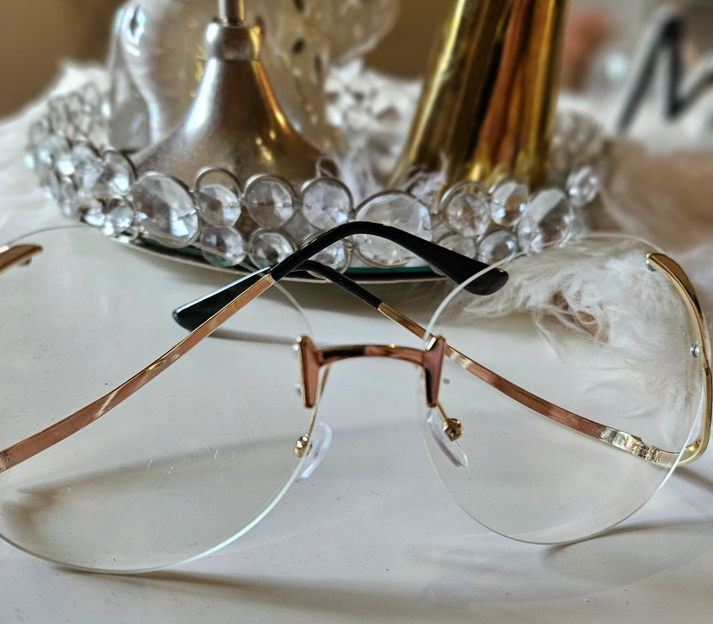 Clear and gold Sunglasses