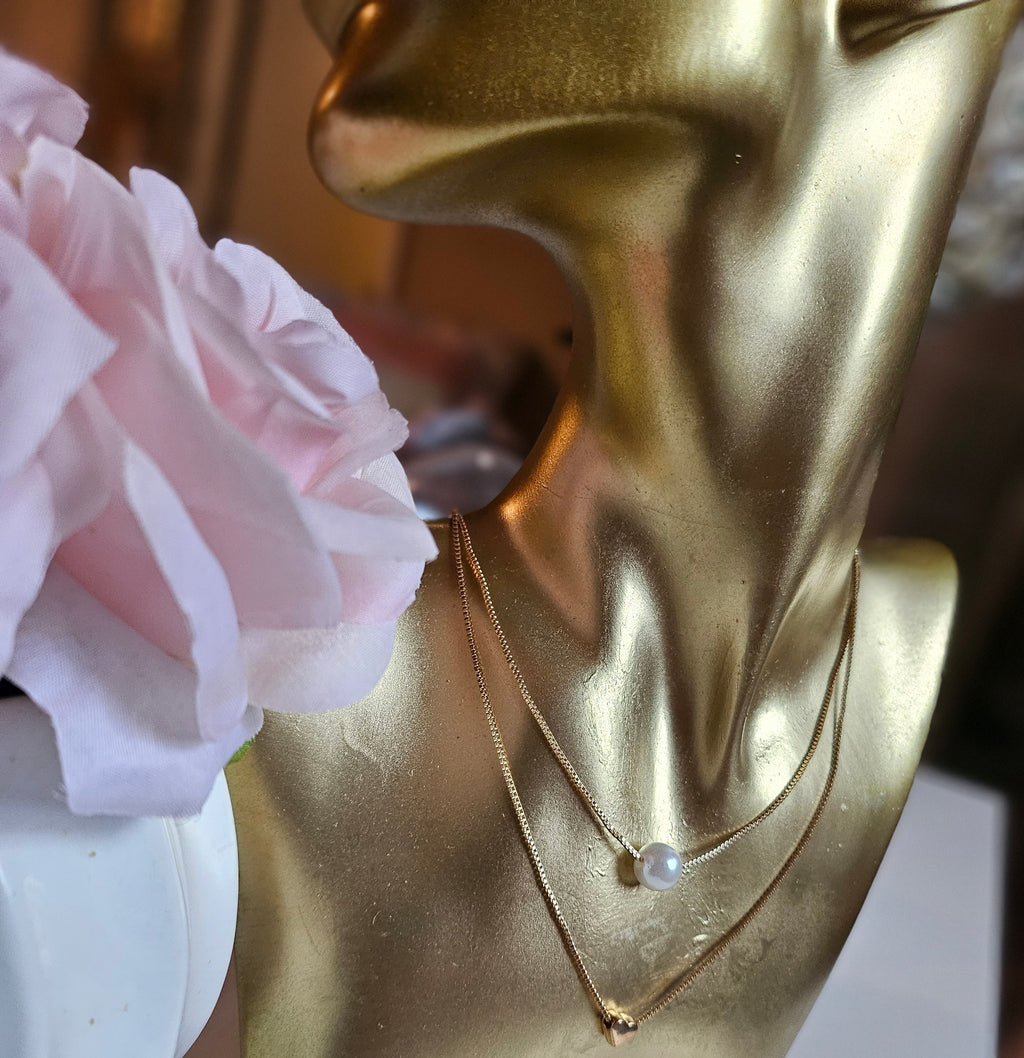 Pearl and heart necklace set