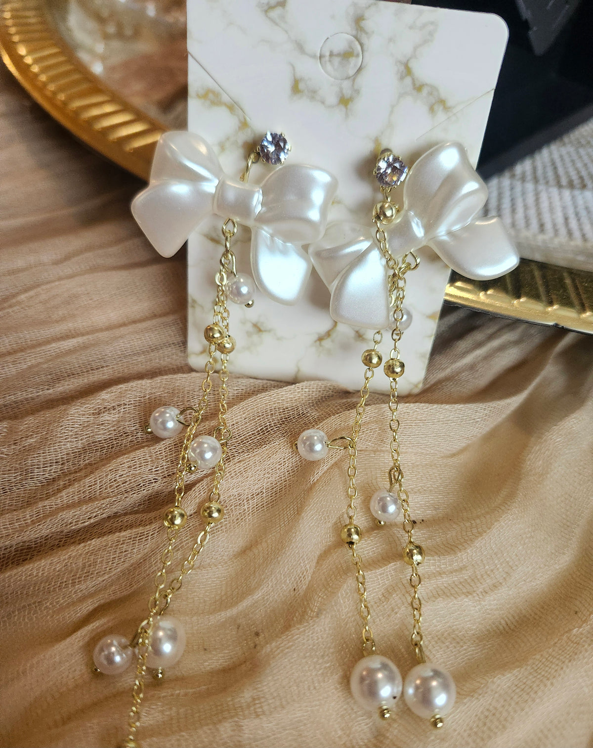 Bow n pearls Earrings