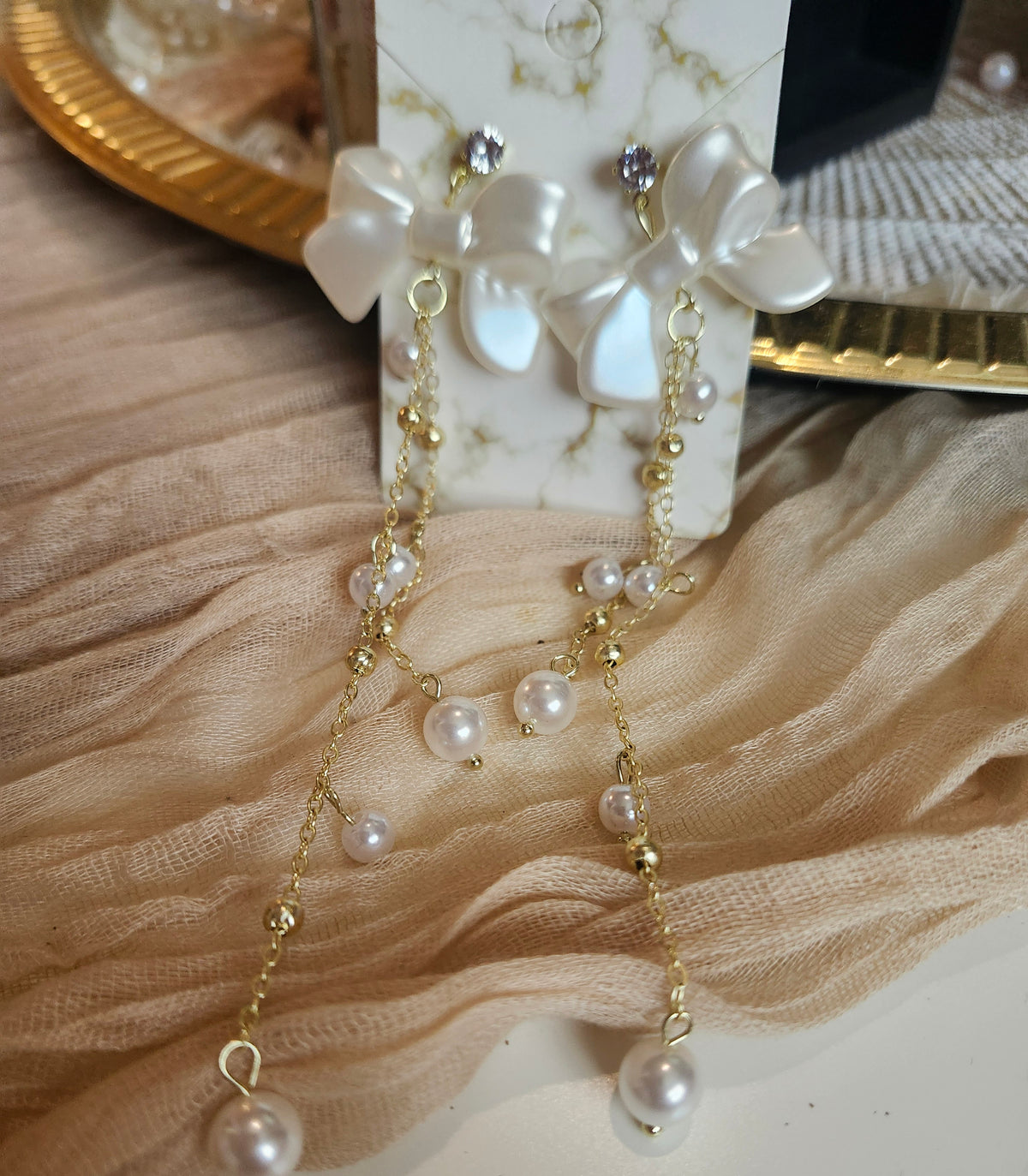 Bow n pearls Earrings