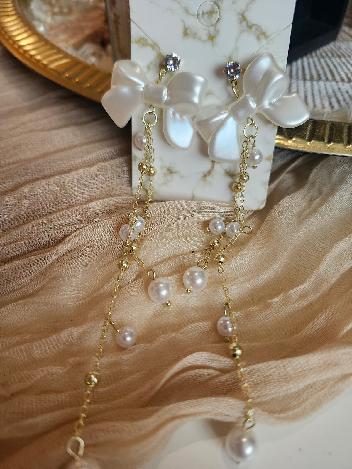 Bow n pearls Earrings