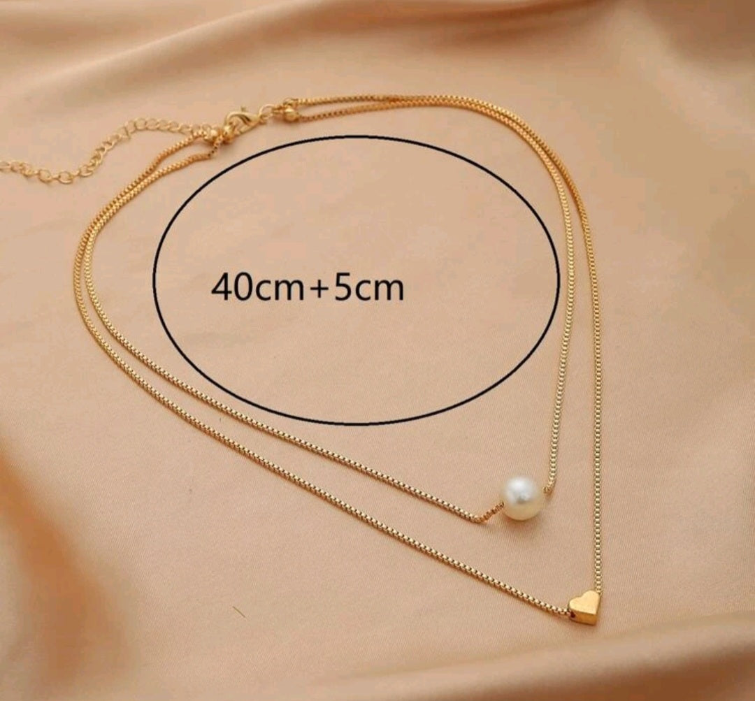 Pearl and heart necklace set