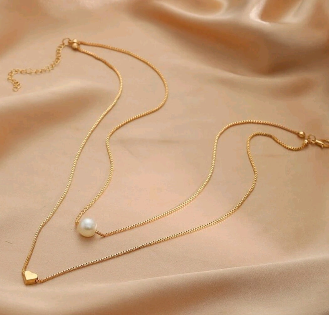Pearl and heart necklace set