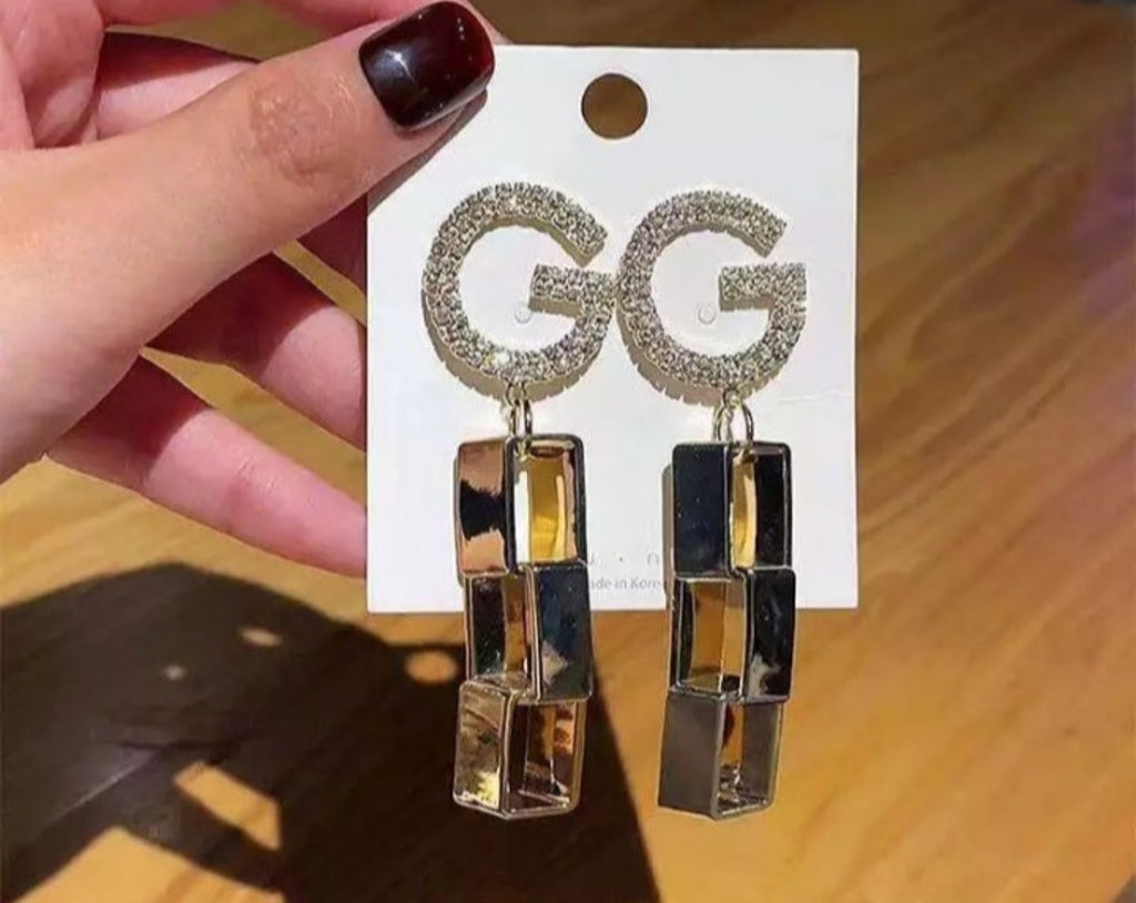 G square earrings